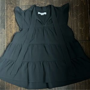 A black sleeveless elegant top!